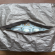 Illustration for article titled Your Next Heist Needs This Cash Carrying Bag That Blocks All Tracking Signals
